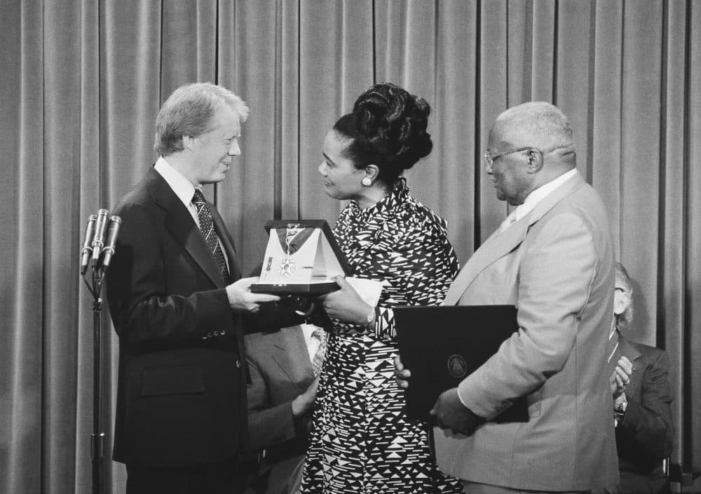 President Jimmy Carter, left, presents the Medal of Freedom Award to Coretta Scott King during a ceremony at the White House on July 11, 1977. (AP)
