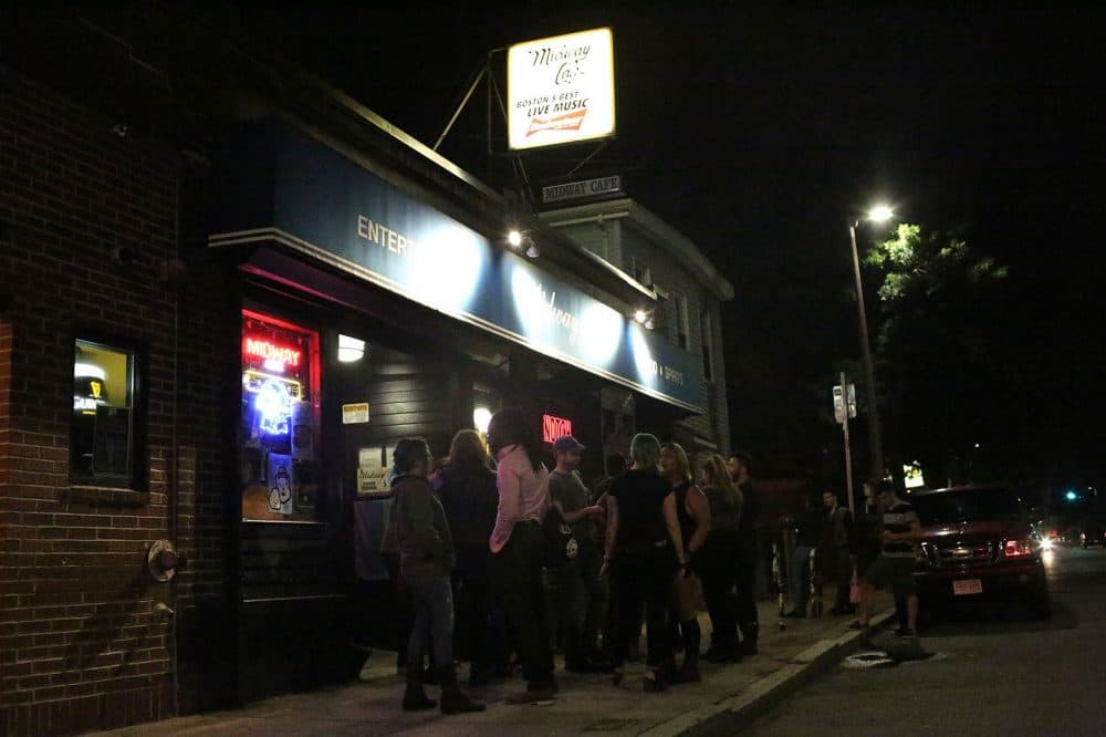 The line outside Midway Cafe on Washington Street in JP on a recent Thursday night. (Hadley Green for WBUR)
