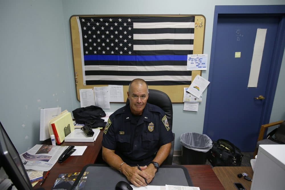 Taunton police Lt. Paul Roderick sits behind his desk at police headquarters in Taunton, Mass. (Stephan Savoia/AP)