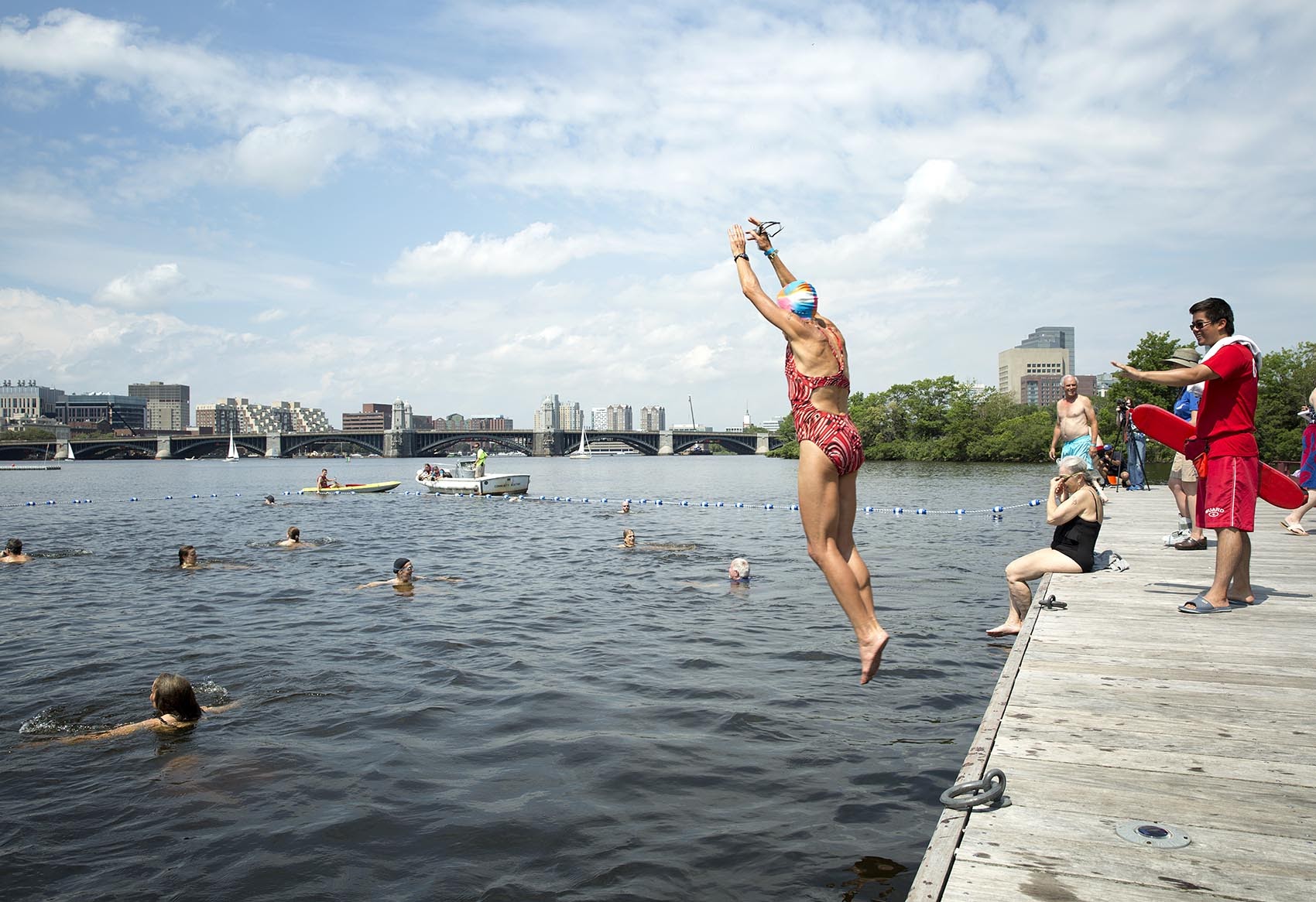 Swimmers jump into the Charles River at City Splash. (Robin Lubbock/WBUR)