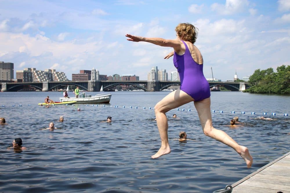 Swimmers jump into the Charles for City Splash. (Kathleen Dubos for WBUR)