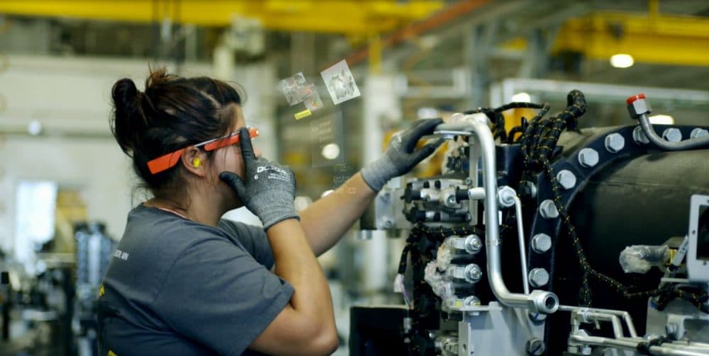 A factory worker in Jackson, Minn., uses Google Glass on the assembly line. (Courtesy AGCO)