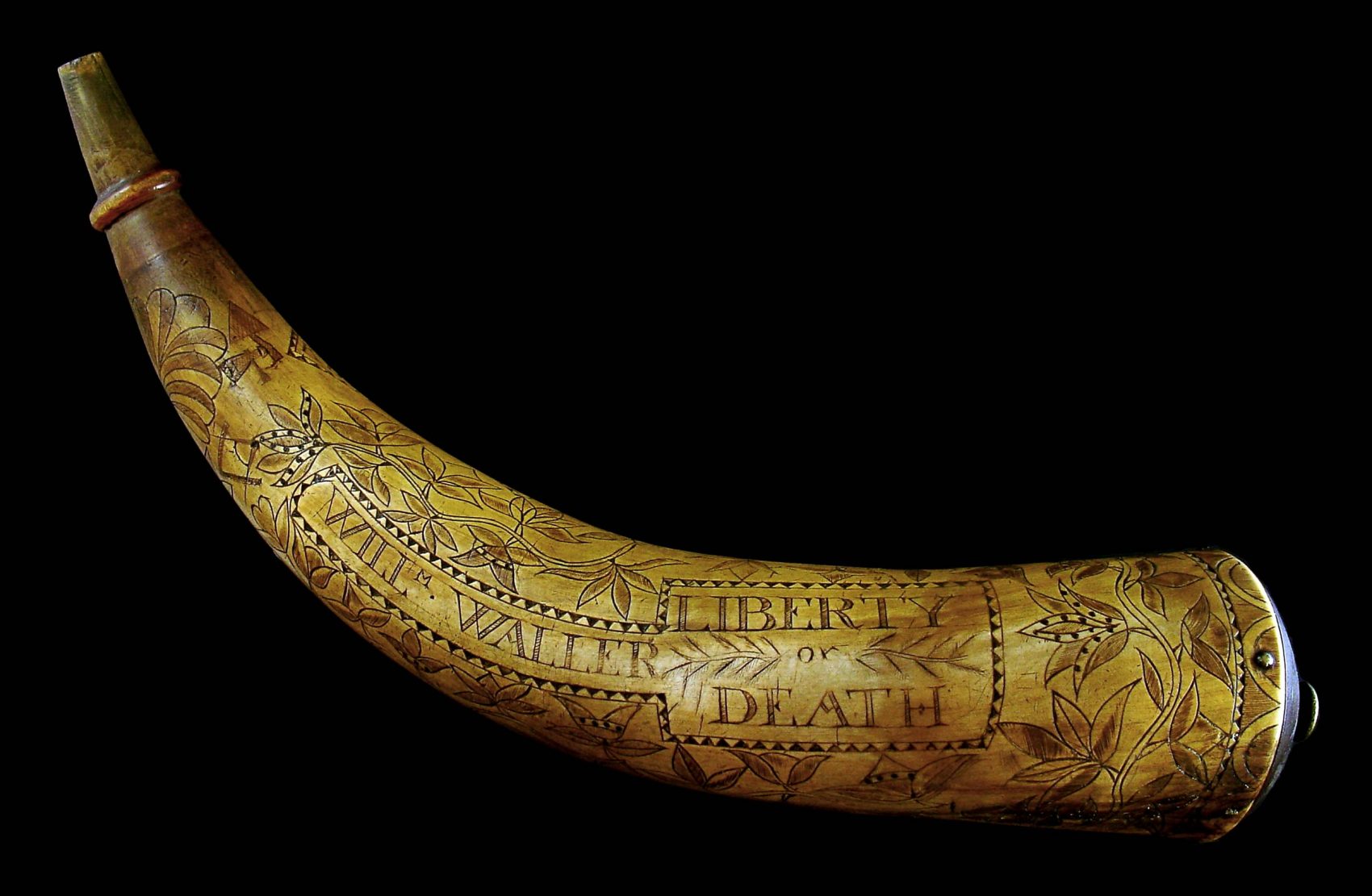 An engraved powder horn bearing several popular slogans of the War of Independence. (Courtesy of the Museum of the American Revolution)