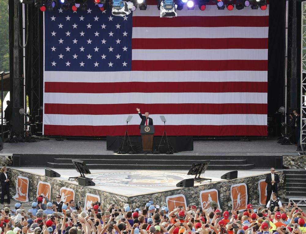 President Trump waves to the crowd of scouts at the 2017 National Boy Scout Jamboree at the Summit in Glen Jean,W. Va., on Monday. (Steve Helber/AP)