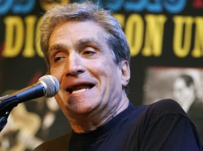 Former U.S. poet laureate Robert Pinsky recites one of his poems on stage in 2010. (Mel Evans/AP)