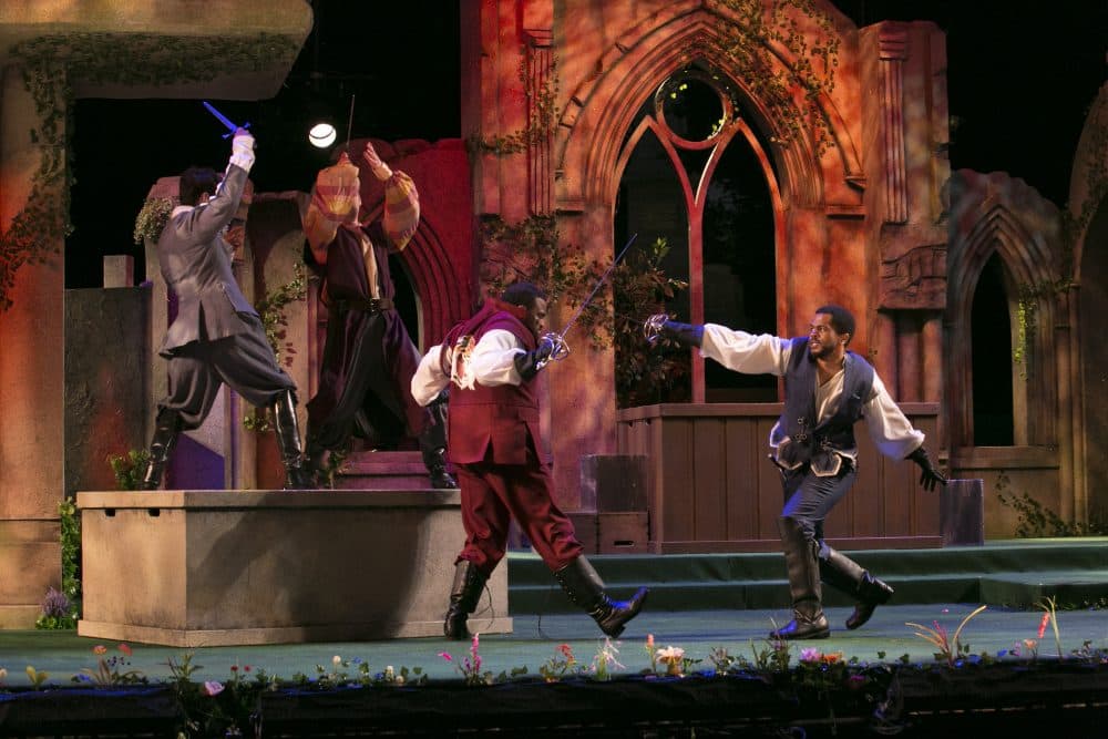 In the foreground, Kai Tshikosi as Tybalt and Brandon G. Green as Benvolio battle it out. (Courtesy Evgenia Eliseeva)