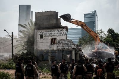 The house of Maria da Penha Macena is demolished on March 8, 2016. (Yasuyoshi Chiba/AFP/Getty Images)