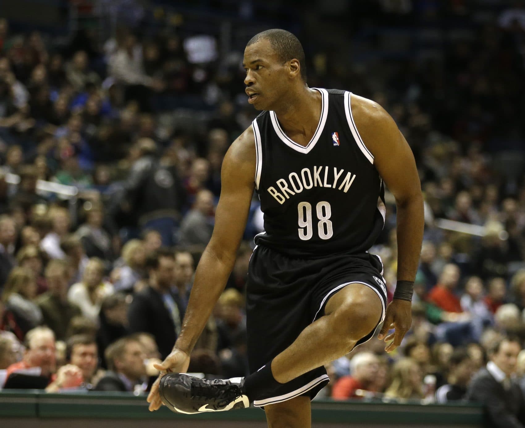 During the NBA lockout of 2011, everything started to change for Jason Collins. "I was sitting on my couch with my dog, watching TV and thinking 'Is this going to be it for the rest of my life?'"(Jeffrey Phelps/AP)