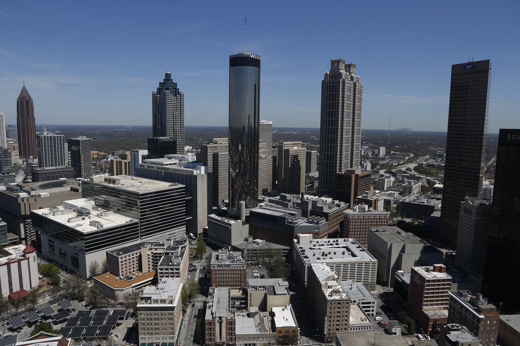 New York-based writer Reniqua Allen is noticing a new trend among black millennials — they’re moving south. Pictured: The Atlanta skyline in 2014. (Mike Stewart/AP)