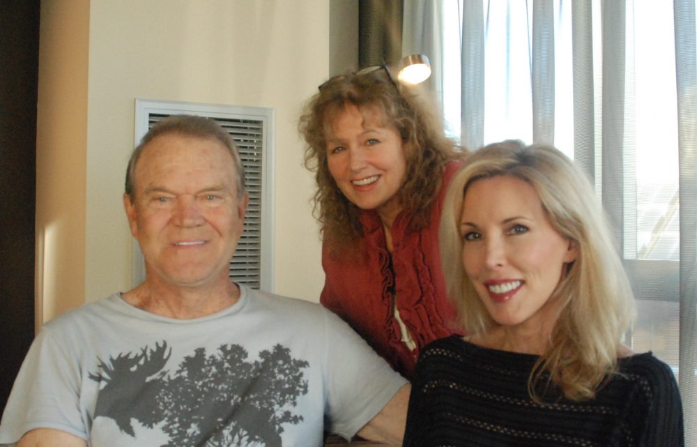 Here &amp; Now’s Robin Young (center) visited with Glen Campbell and his wife Kim in 2012. (Alex Ashlock/Here &amp; Now)