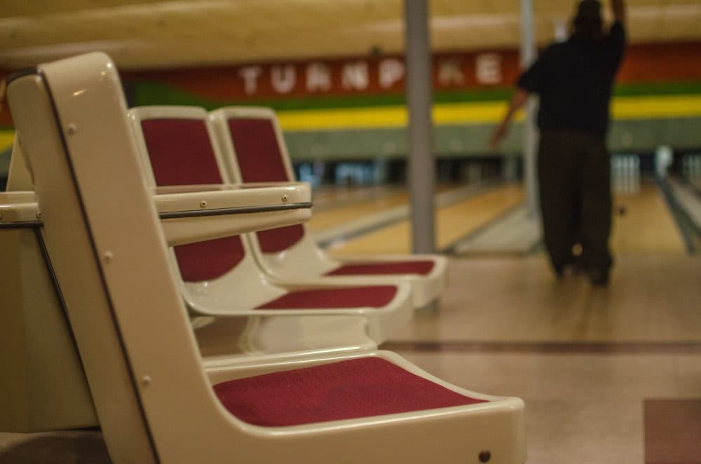 In a lull before the evening rush just before Lanes and Games is no more, manager Bruce Brown spends some time alone on the candlepins lanes. &quot;It was never emotional until ten days ago when I put that closing sign up. I've been here 24 years and it wasn't affecting me. Then all of a sudden all the emotions came running back.&quot; (Sharon Brody/WBUR)