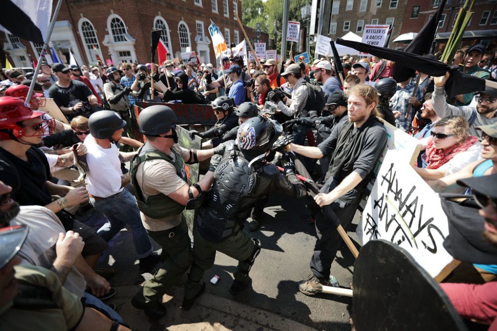 White nationalists, neo-Nazis and members of the &quot;alt-right&quot; clash with counter-protesters as they enter Emancipation Park during the &quot;Unite the Right&quot; rally on Aug. 12, 2017 in Charlottesville, Va. (Chip Somodevilla/Getty Images)