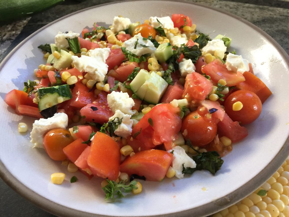 Kathy's sautéed corn salad with tomatoes, cucumber and feta with basil vinaigrette. (Kathy Gunst for Here &amp; Now)