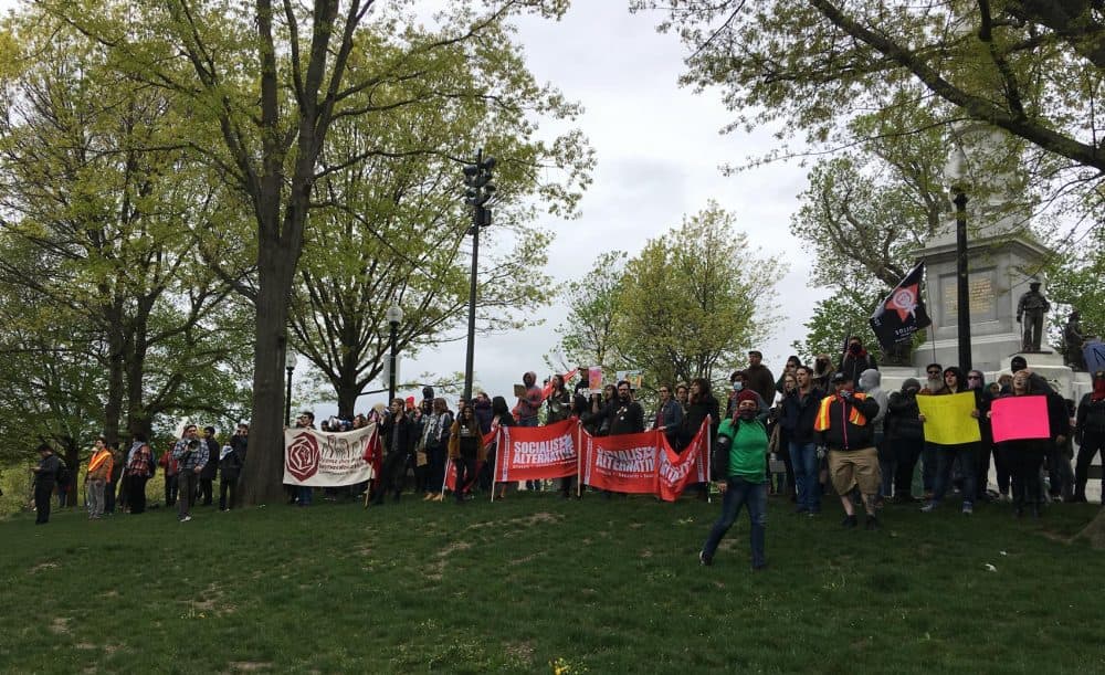 A crowd of counter-protesters gathered around the Soldiers and Sailors Monument in Boston Common in May. (Max Larkin/WBUR)