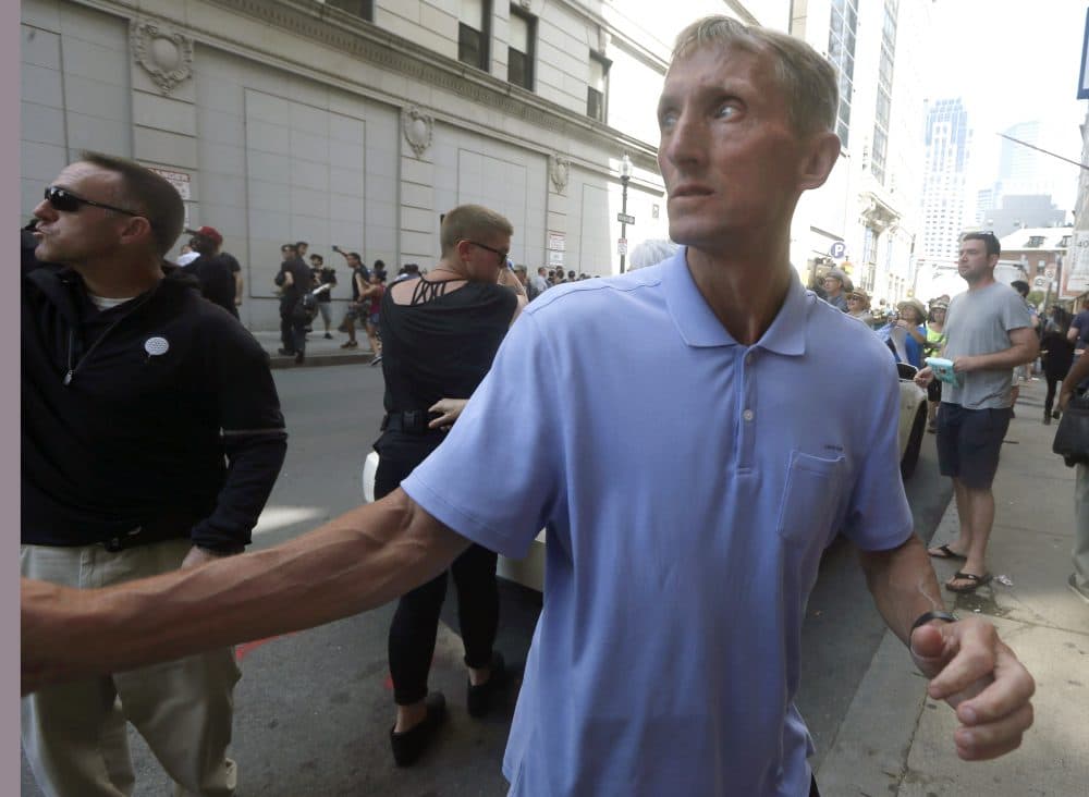 Boston Police Commissioner William Evans watches counter-protesters near the rally. (Michael Dwyer/AP)