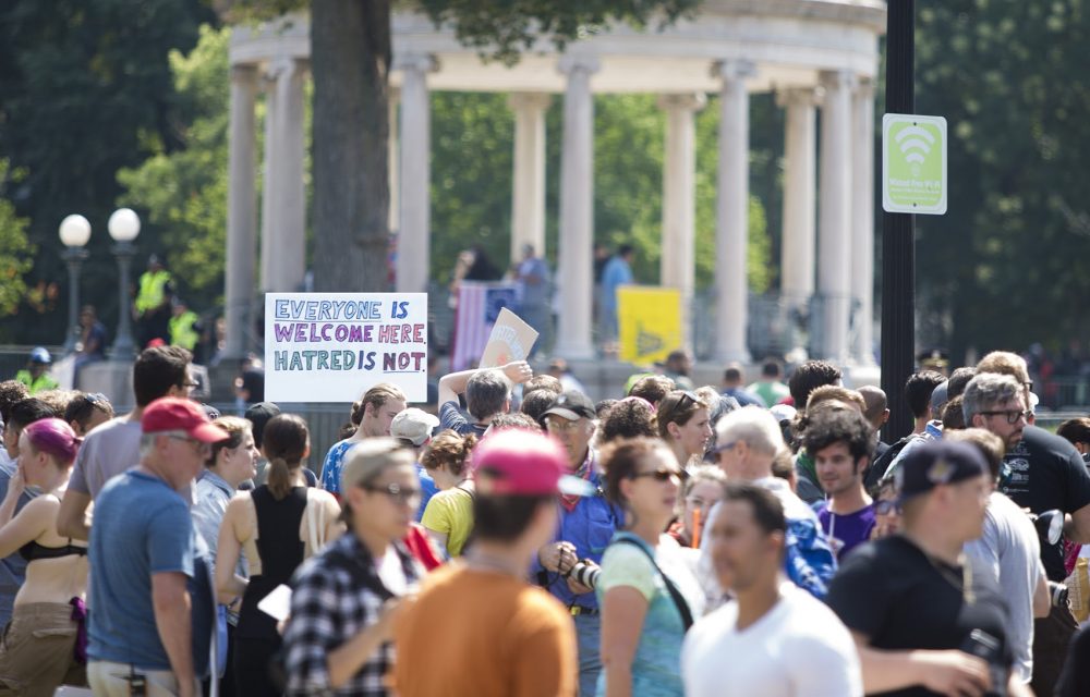 Counter protesters amassed outside of the barriers at the Parkman Bandstand. (Jesse Costa/WBUR)