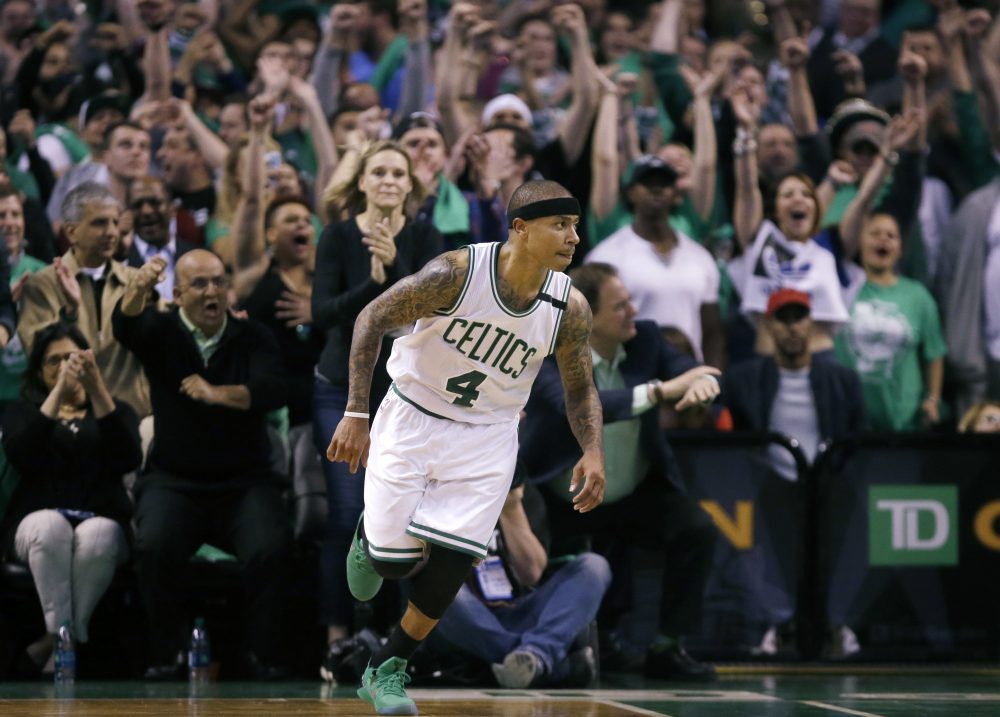 Boston Celtics fans cheer as guard Isaiah Thomas runs up court after a made basket during the fourth quarter of Game 7 of a second-round NBA basketball playoff series against the Washington Wizards in May. (Charles Krupa/AP)