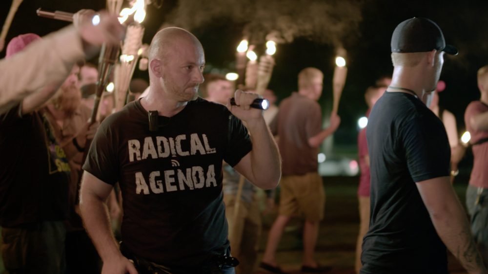 In this image made from a video provided by Vice News Tonight, Christopher Cantwell is seen at a white nationalist rally in Charlottesville, Va. (Vice News Tonight via AP)