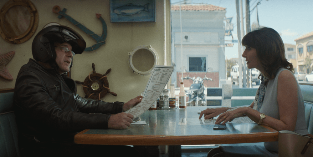 Harvey (Paul Reiser) and Cybil (Mary Steenburgen) sniping at one another in a diner. (Courtesy The FIlm Arcade)