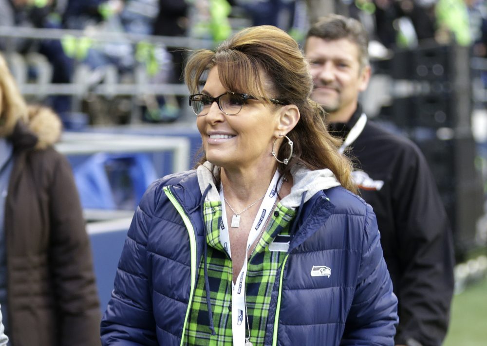 In this Dec. 15, 2016, file photo, Sarah Palin, political commentator and former governor of Alaska, walks on the sideline before an NFL football game between the Seattle Seahawks and the Los Angeles Rams in Seattle. (Scott Eklund/AP)