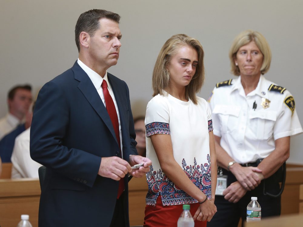 With her defense attorney Joseph Cataldo at left, Michelle Carter listens to her sentencing for involuntary manslaughter for encouraging 18-year-old Conrad Roy III to kill himself in July 2014. (Matt West/The Boston Herald via AP, Pool)