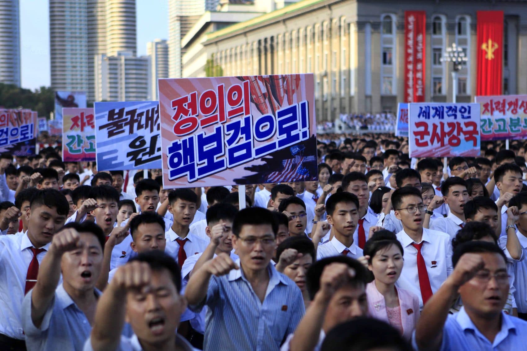 North Koreans gather for a rally at Kim Il Sung Square as a show of support for their rejection of the United Nations' latest round of sanctions on Wednesday Aug. 9, 2017, in Pyongyang, North Korea. (Jon Chol Jin/AP)