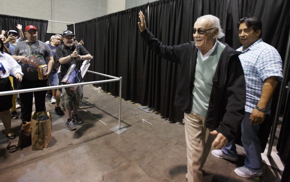 Stan Lee waves to fans as he arrives for an autograph signing at Boston Comic Con, Friday, Aug. 11, 2017, in Boston. The convention is being held at the Boston Convention &amp; Exhibition Center through Sunday. (AP Photo/Michael Dwyer)