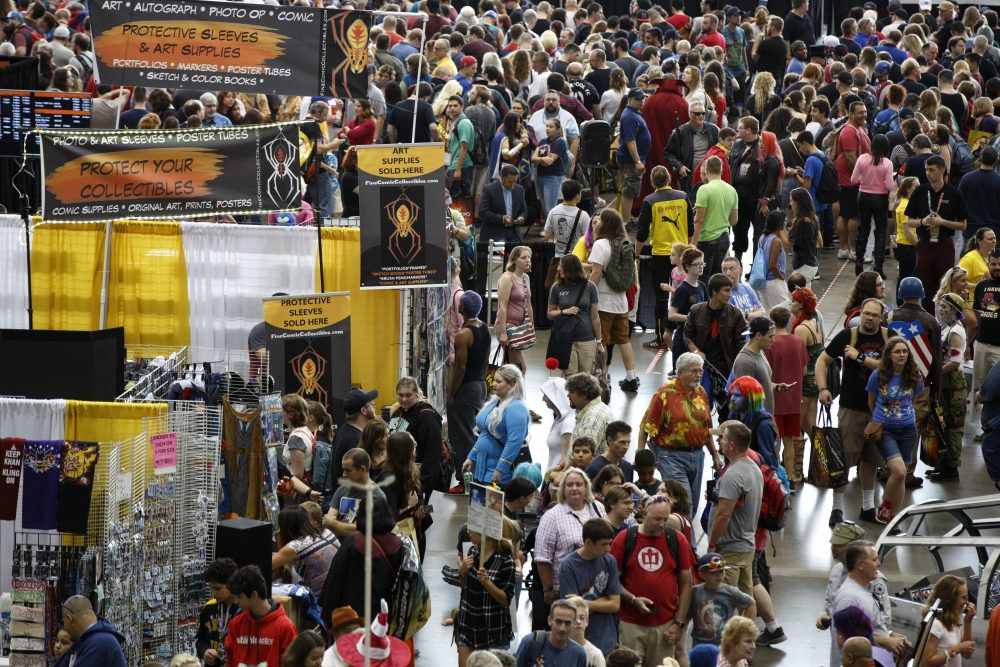 Fans crowd the display floor at Boston Comic Con, Friday, Aug. 11, 2017, in Boston. The convention is being held at the Boston Convention &amp; Exhibition Center through Sunday. (AP Photo/Michael Dwyer)
