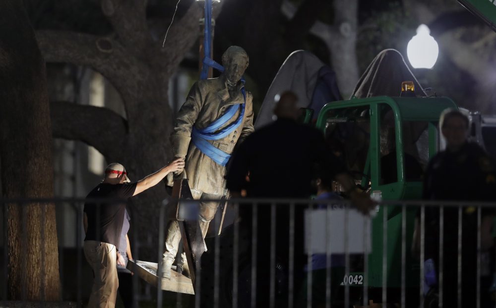 A statue of Confederate Gen. Robert E. Lee is removed from the University of Texas campus, early Monday morning, Aug. 21, 2017, in Austin, Texas. (Eric Gay/AP)