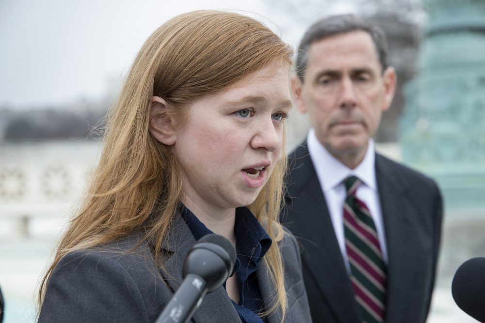 Abigail Fisher, who challenged the use of race in college admissions, joined by lawyer Edward Blum, right, speaks to reporters outside the Supreme Court in Washington, Wednesday, Dec. 9, 2015, following oral arguments in the Supreme Court. (J. Scott Applewhite/AP)