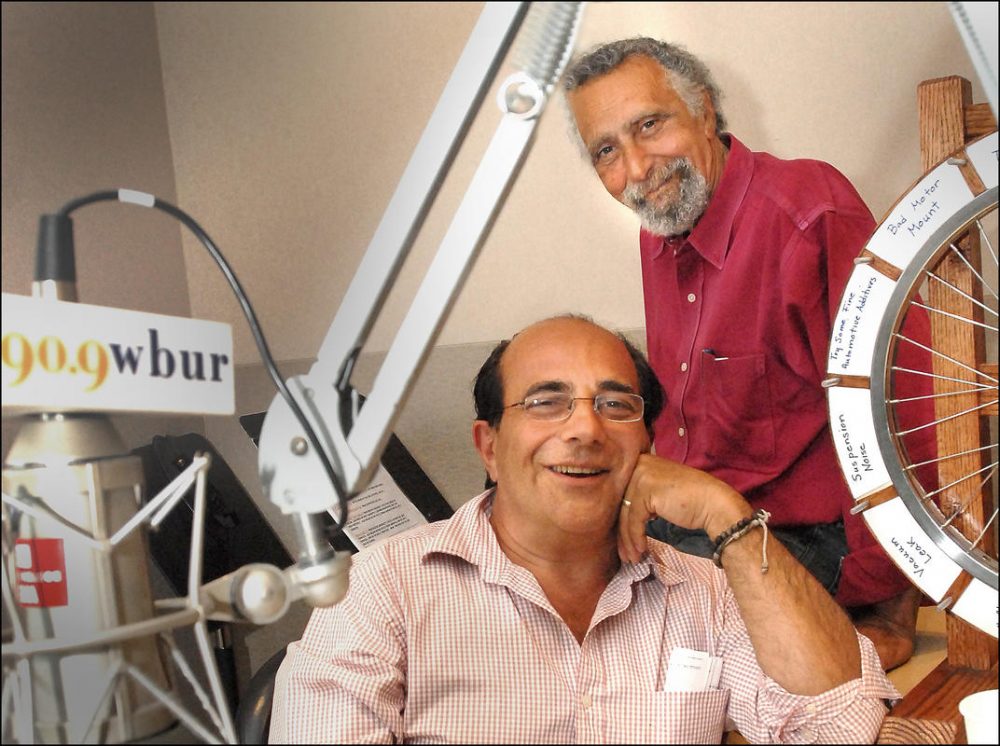 Tom Magliozzi, behind, and Ray Magliozzi celebrate 20 years on the radio at the WBUR studios on June 13, 2007. (Ted Fitzgerald/WBUR)
