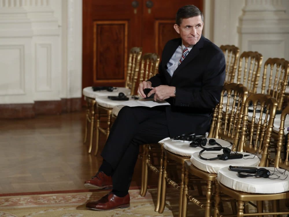 Michael Flynn, Trump's former national security adviser, sits in the front row before the start of the joint news conference with the president and Japanese Prime Minister Shinzo Abe in the East Room of the White House, in Washington, Friday, Feb. 10, 2017. (Carolyn Kaster/AP)