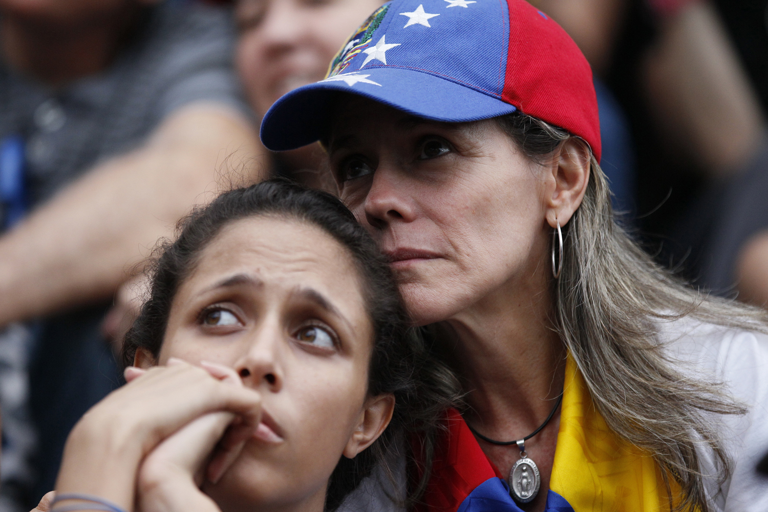 Anti-government demonstrators attend a vigil in honor of those who have been killed during clashes between security forces and demonstrators in Caracas, Venezuela, Monday, July 31, 2017. (Ariana Cubillos/AP)