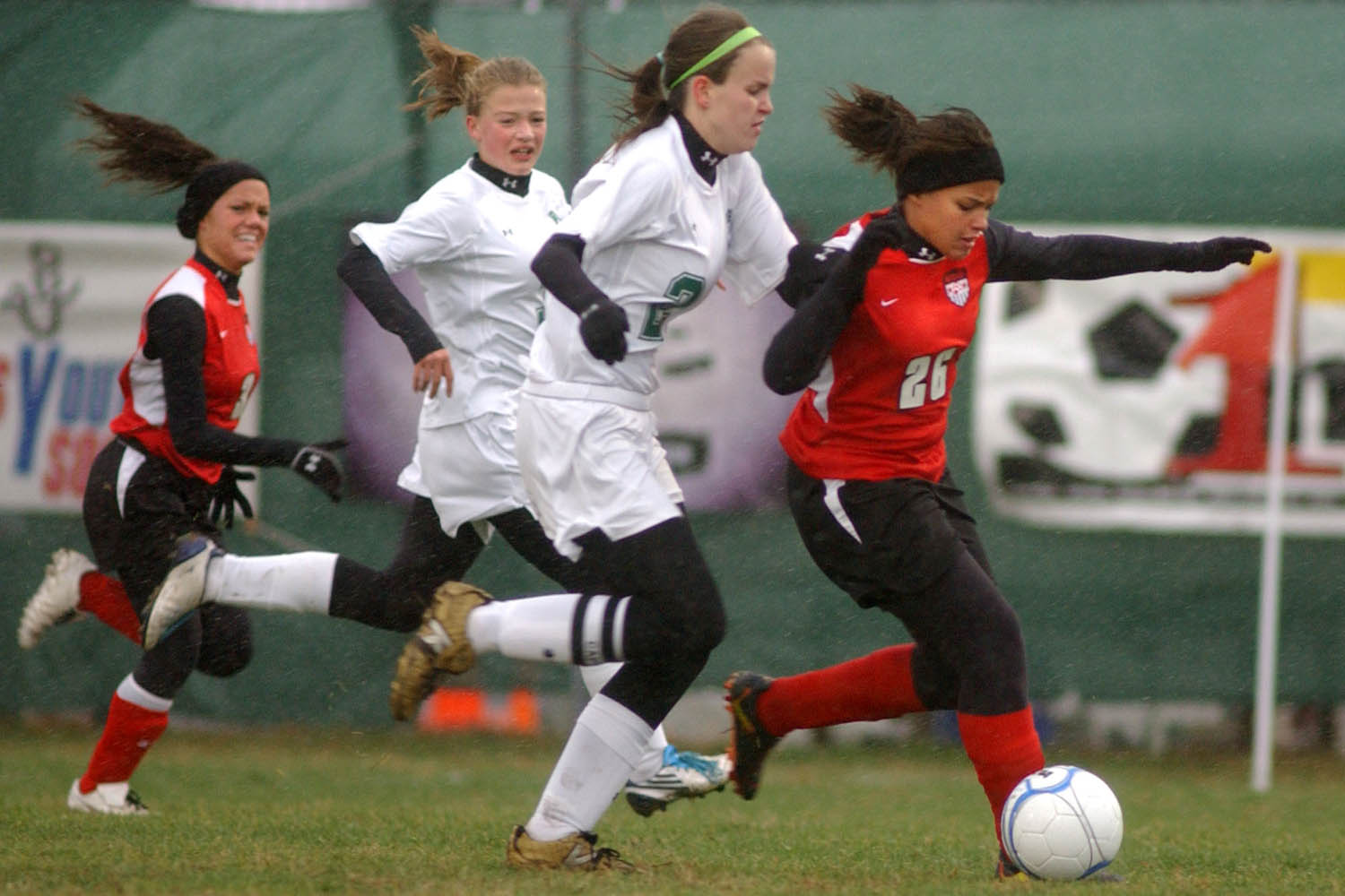 Players take part in a soccer match. (Jon C. Hancock/AP)
