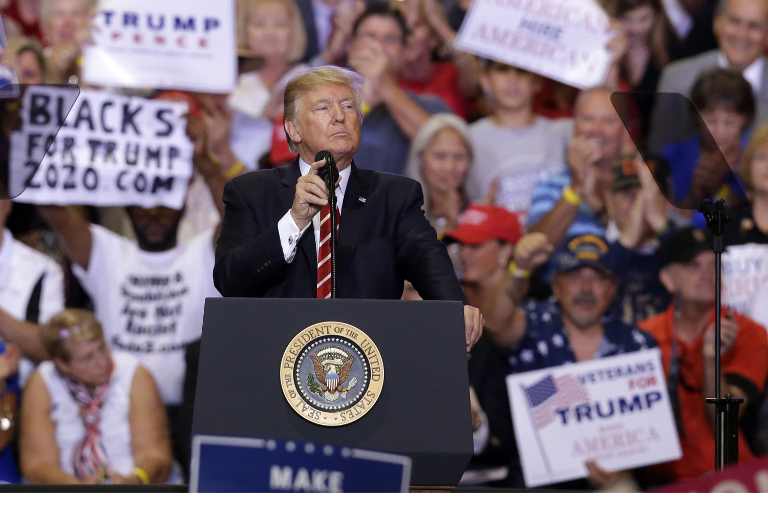 President Donald Trump gestures to the crowd while speaking at a rally at the Phoenix Convention Center, Tuesday, Aug. 22, 2017, in Phoenix. (Rick Scuteri/AP)