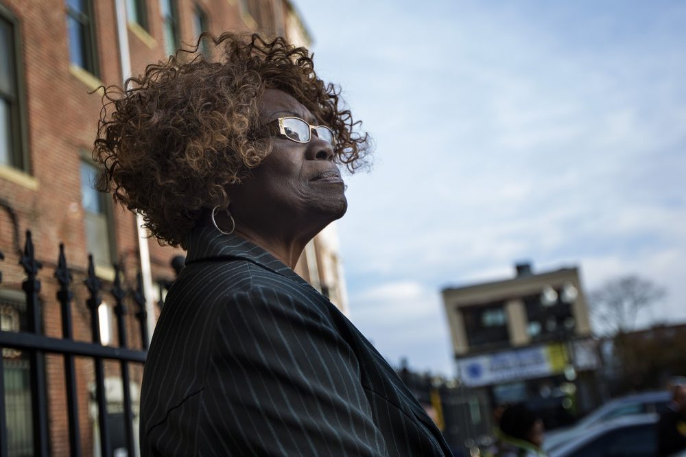 Rosa Jackson watches her son as he declares his candidacy for mayor in January. (Jesse Costa/WBUR)