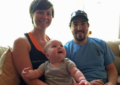 Erin and Jeff with their daughter, Nora, in 2015. (Alex Ashlock/WBUR)