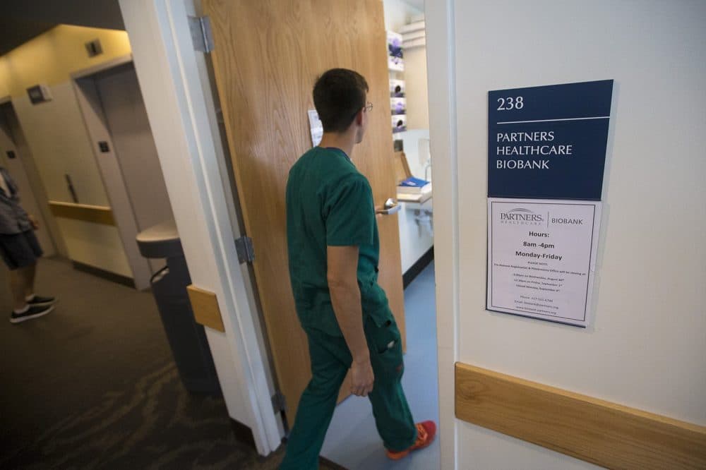 Jeff Osman walks into the biobank phlebotomy office. (Jesse Costa/WBUR)