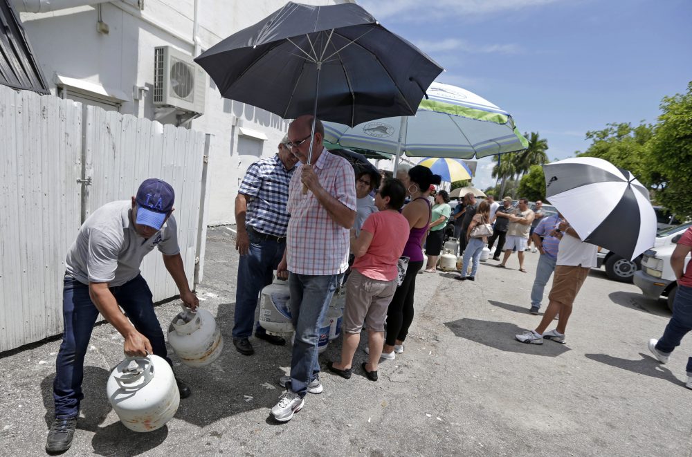 Residents stand in line to purchase propane gas as they prepare for Hurricane Irma, Tuesday, Sept. 5, 2017, in Hialeah, Fla. Hurricane Irma grew into a dangerous Category 5 storm, the most powerful seen in the Atlantic in over a decade, and roared toward islands in the northeast Caribbean Tuesday on a path that could eventually take it to the United States. (Alan Diaz/AP)