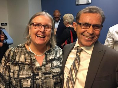 Victor Rosario, right, with his wife Beverly, following a hearing during which he was formally exonerated. (Deborah Becker/WBUR)