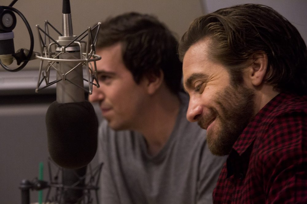 Jake Gyllenhaal, front, and Jeff Bauman in the WBUR studio during an interview on Here &amp; Now. (Jesse Costa/WBUR)