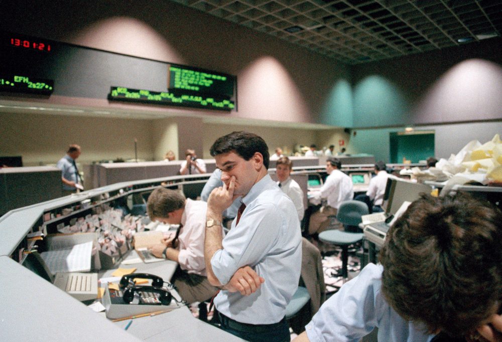 Securities specialist assistant Spencer Varian of Wedbush Securities Co., looks dejected as he watches stock prices plunge on his computer terminal, Oct. 19, 1987, in Los Angeles at the Pacific Stock Exchange. The Pacific Exchange was one of many around the world that felt panic as the Dow Jones average plunged more than 500 points. (Lennox McLendon/AP)