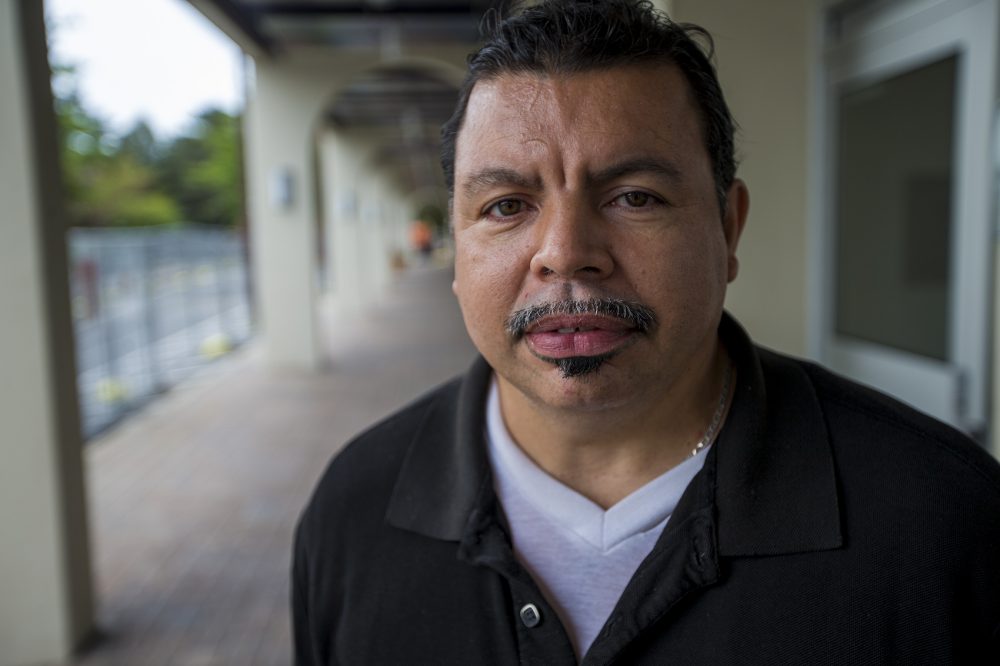 Efrain Nieve says he has not heard from his elderly aunt in Puerto Rico in a couple of days. (Jesse Costa/WBUR)