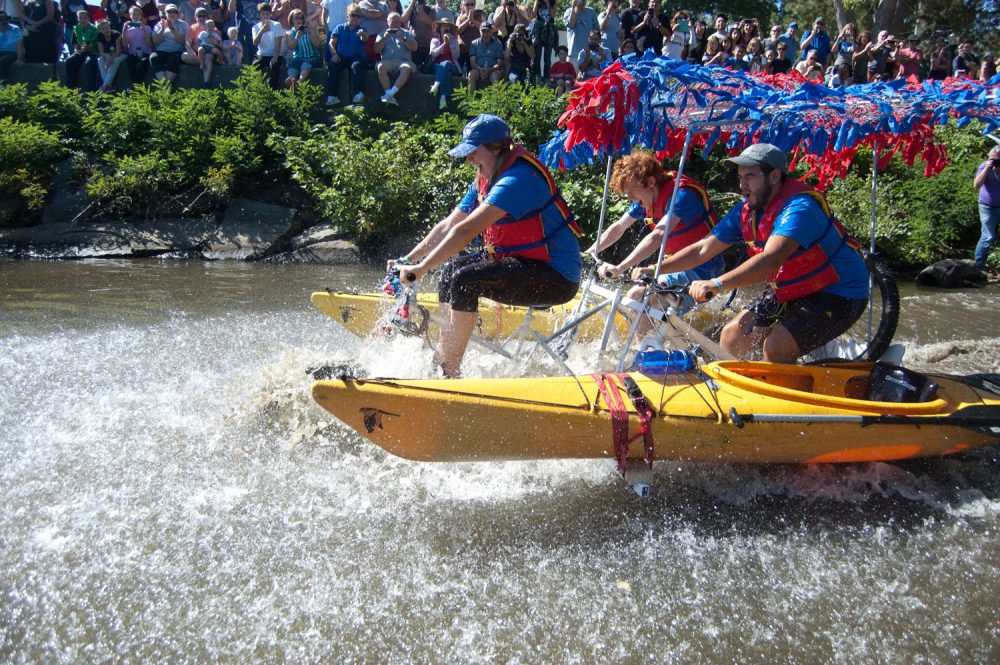 &quot;Rowdy River Rollers&quot; by students from the University of Massachusetts at Lowell splashes into the Merrimack River. (Greg Cook/WBUR)