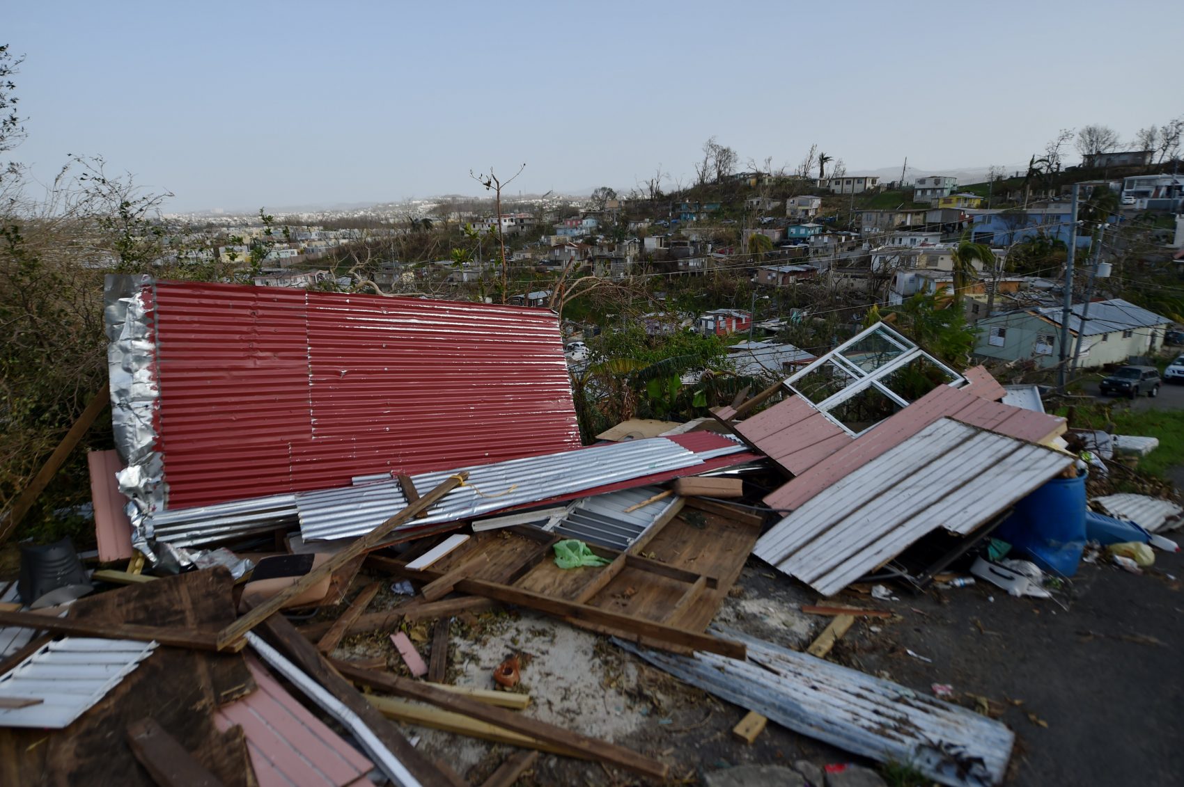 Destroyed homes are seen following the passage of Hurricane Maria in the neigborhood of Acerolas in Toa Alto, Puerto Rico, on Sept. 26, 2017. (Hector Retamal/AFP/Getty Images)