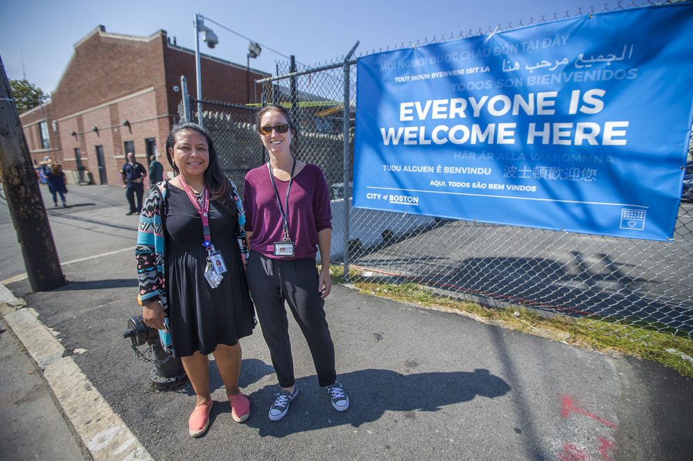 Devin Larkin, right, who oversees the engagement center as director of the Bureau of Recovery Services at the Boston Public Health Commission, stands with Yailka Cardenas, a program director at the bureau. (Jesse Costa/WBUR)