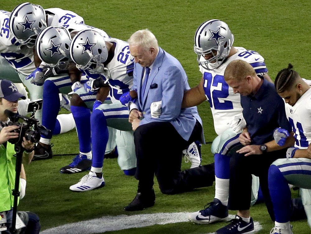 Should we be surprised that NFL owners like Jerry Jones (center) have supported players following President Trump's comments about the NFL? (Matt York/AP)