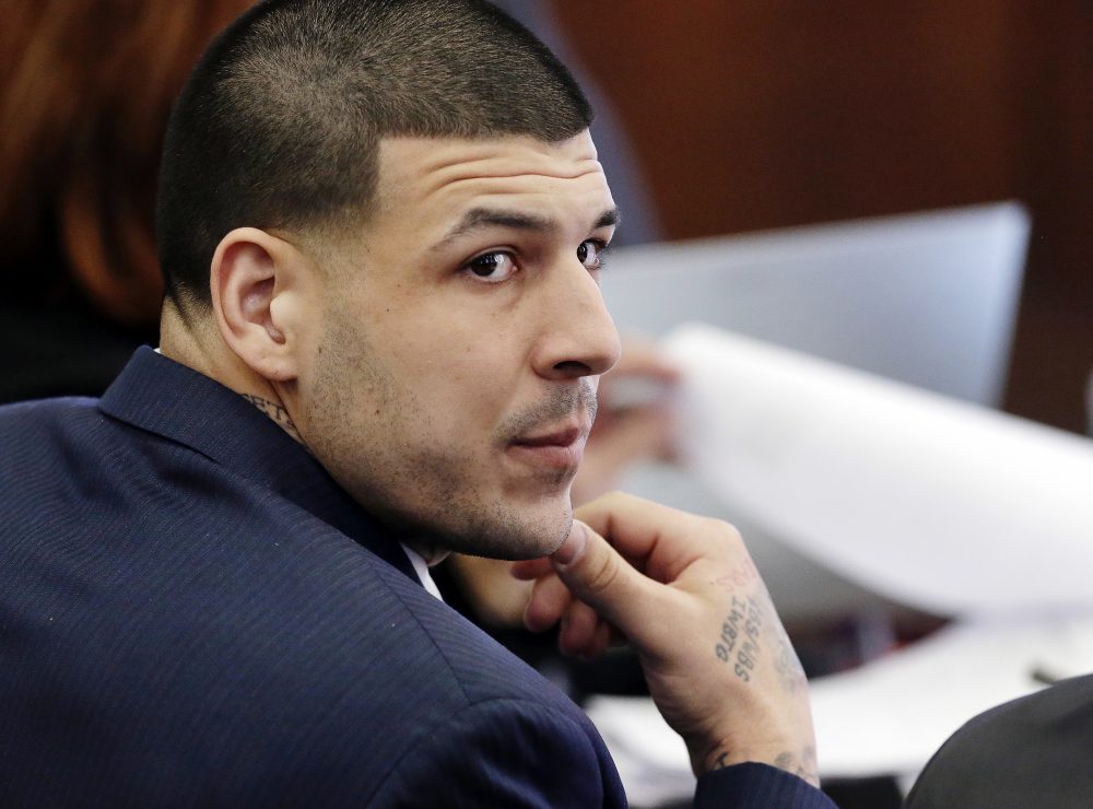 Aaron Hernandez listens during his double murder trial in Suffolk Superior Court, Wednesday, March 15, 2017, in Boston. (Elise Amendola/AP)