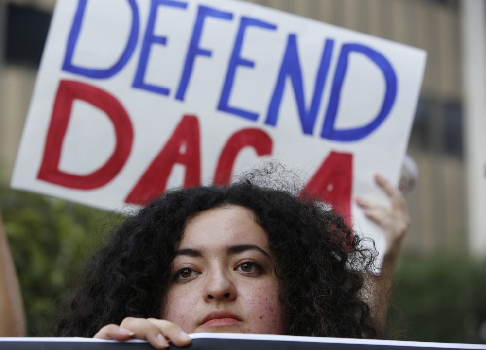Loyola Marymount University student and dreamer Maria Carolina Gomez joins a rally in support of the Deferred Action for Childhood Arrivals, or DACA program outside the Edward Roybal Federal Building in Los Angeles Friday, Sept. 1, 2017. (Damian Dovarganes/AP)