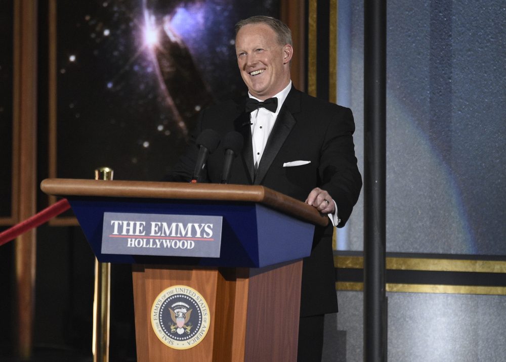 Former White House press secretary Sean Spicer appears with a podium at the 69th Emmy Awards. (Chris Pizzello/Invision/AP)
